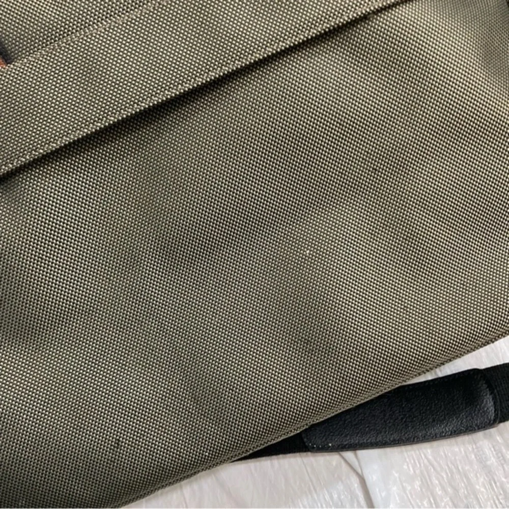 Longchamp canvas and leather duffle travel bag unisex